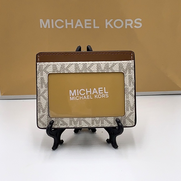 MICHAEL KORS
Leather Large Card Holder Case Wallet
vanilla signature color - Picture 4 of 8